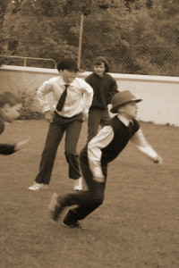 boys playing football